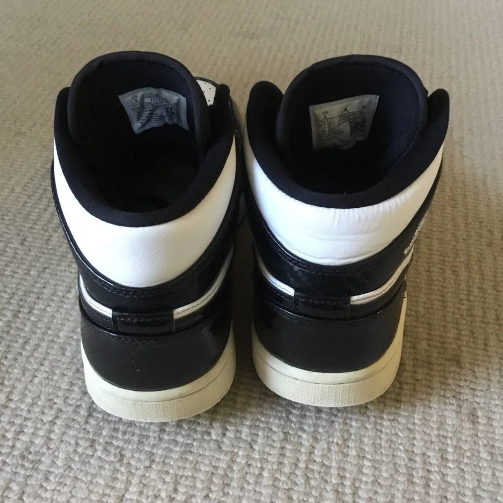 Jordan Black and White High-Top Sneakers